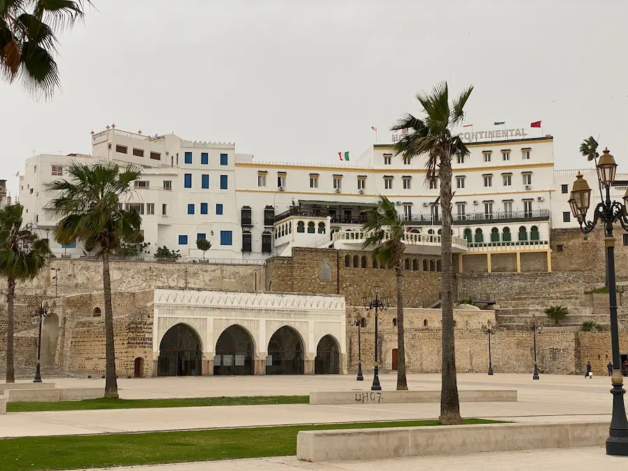 The old medina wall and the Hotel Continental in Tangier, seen from the port esplanade where this transfer stops on the way to the airport
